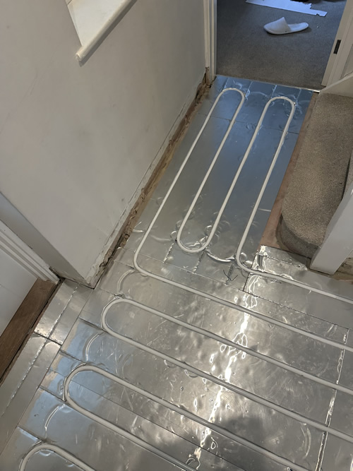 Energy-efficient underfloor heating setup in Ferndown