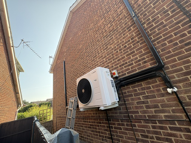 Air conditioning installation outside the Poole property